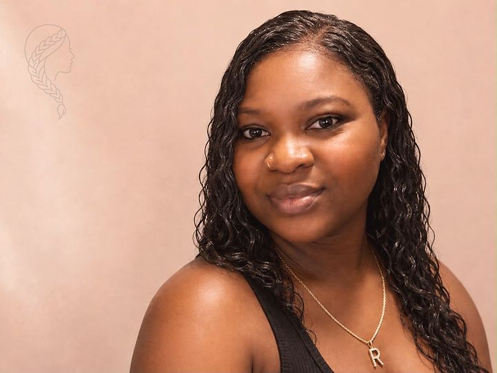 Raffy, the braider behind Raffybraids, in her North York studio